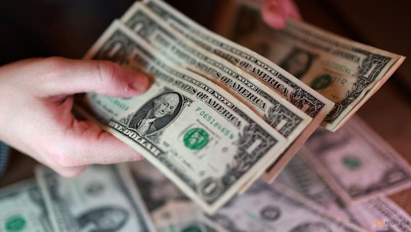 Dollar retreats as traders focus on Iran, Fed policy