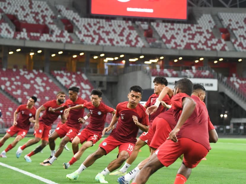 Singapore national football team players warming up ahead of their friendly match against Solomon Islands on June 18, 2023.