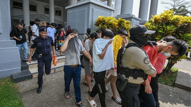 吉隆坡KTV遭蒙面人砸场案 34人认罪被判罚款