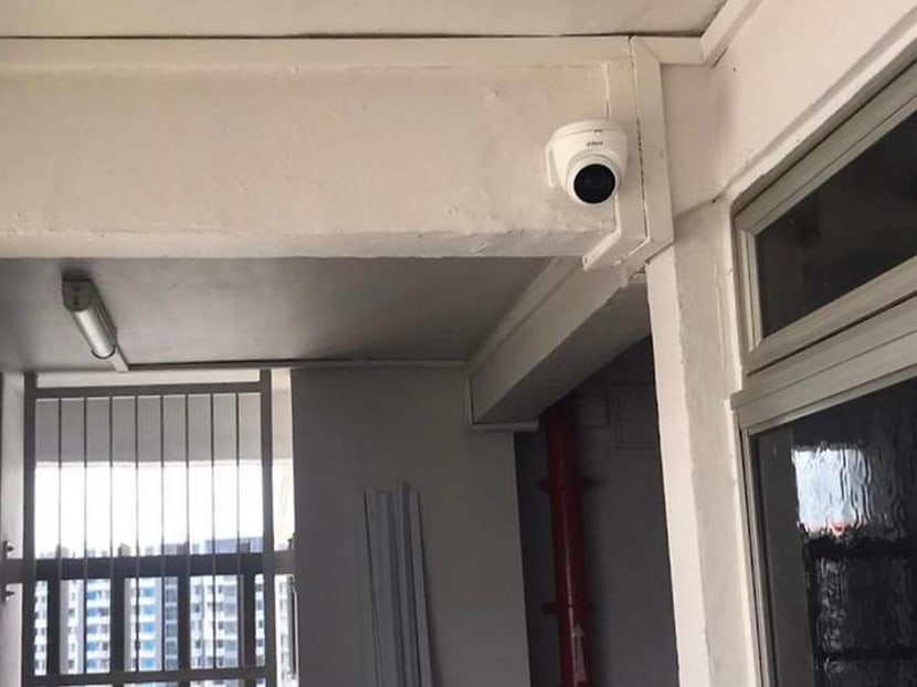 Installing CCTVs outside HDB flats is illegal, but more home owners are doing so, say merchants