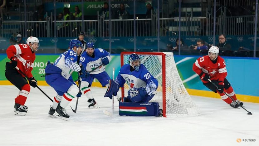 Ice hockey-Swiss ease past Italy to set up quarter-final with Finland