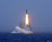 Commentary: Was China’s submarine missile test a routine or warning shot?