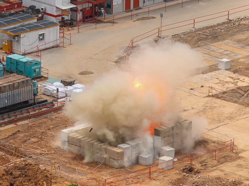 A World War II aerial bomb going off in a controlled detonation in Upper Bukit Timah at about 12.28pm on Sept 26, 2023.