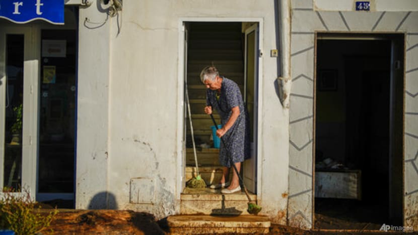 Floods sweep cars into sea, damage homes in northeast Spain