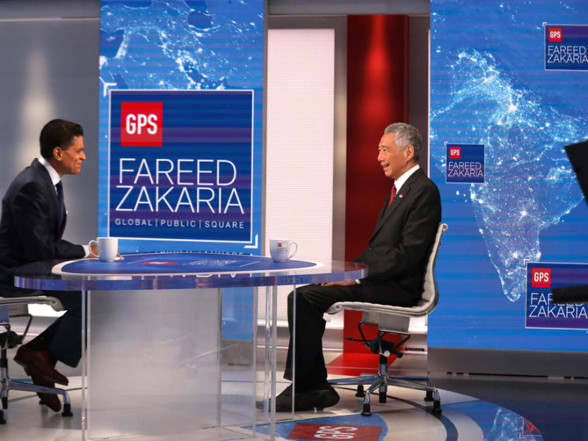 Prime Minister Lee Hsien Loong (right) speaking on current affairs show Fareed Zakaria GP on Oct 6, 2019.