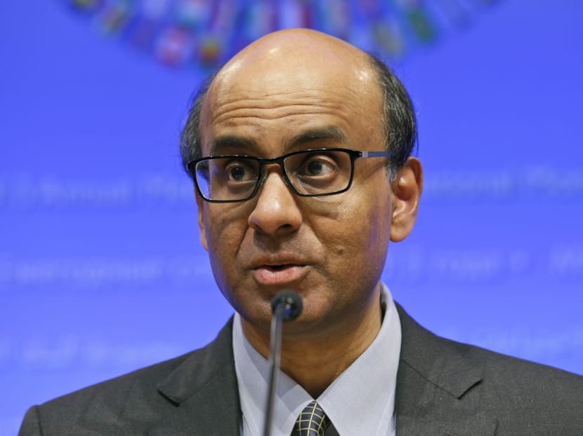 Singaporean Minister for Finance Tharman Shanmugaratnam, who is also the chairman of the IMFC, speaks during a media availability, during the World Bank/IMF Annual Meetings at IMF headquarters Saturday, Oct 12, 2013 in Washington. Photo: AP