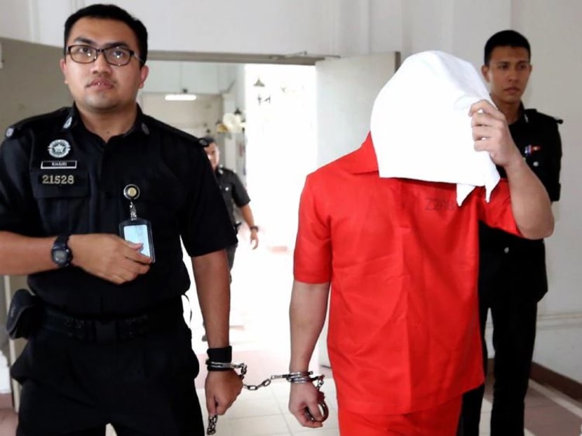 Izwanuddin Kassim, who was married with two children and worked in Singapore, murdered a millionaire businessman whose remains were found burnt in an oil palm estate three years ago. Photo: NEW STRAITS TIMES