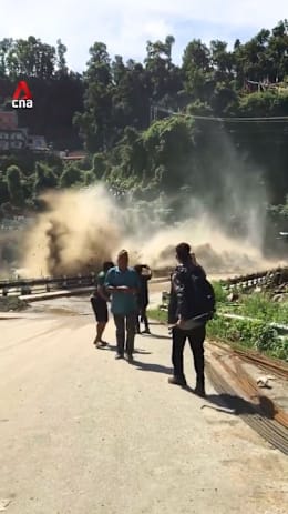 Footage captures bridge being washed away in Nepal flood