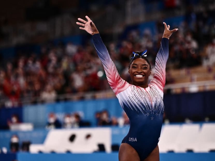 USA's Simone Biles competes in the artistic gymnastics women's balance beam final of the Tokyo 2020 Olympic Games at Ariake Gymnastics Centre in Tokyo on Aug 3, 2021.