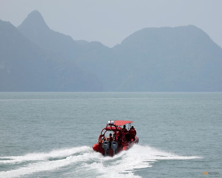 Malaysia steps up search for missing Rohingya boats, toll climbs to 21
