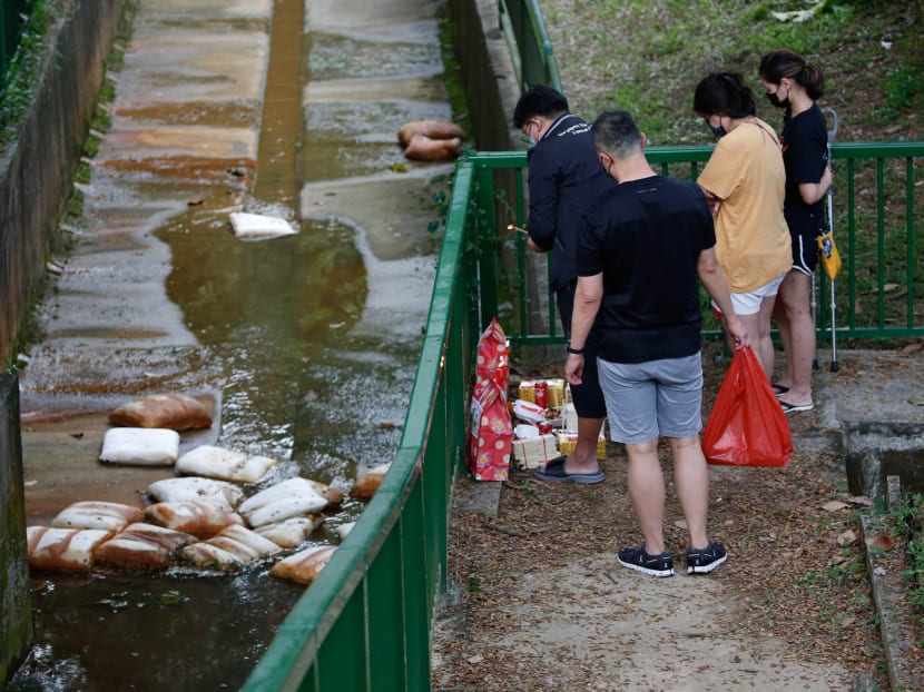 After two boys were found dead, their three relatives and friends, along with a funeral director, performed some prayer rites for them on Jan 22, 2022.