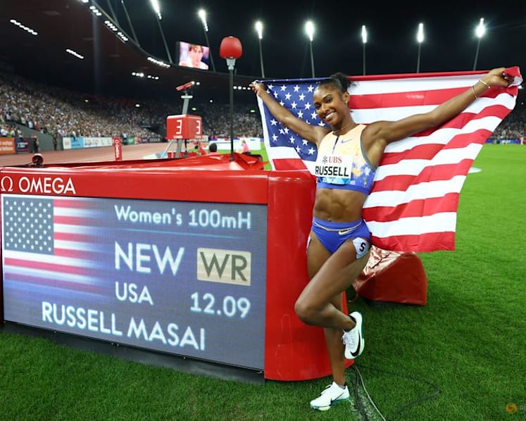 American Russell hurdles to world record in Zurich