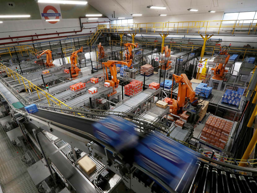 The risks to workers from ever smarter computers are clear, but the opportunities will lie in maximising the value of their human skills. Photo: Reuters