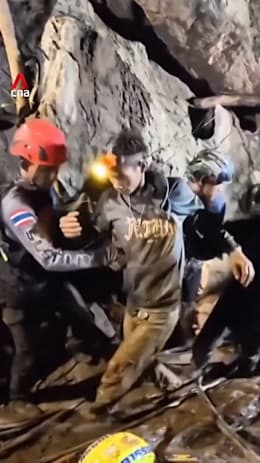 Rescuers pull out first survivor from flooded Laos cave