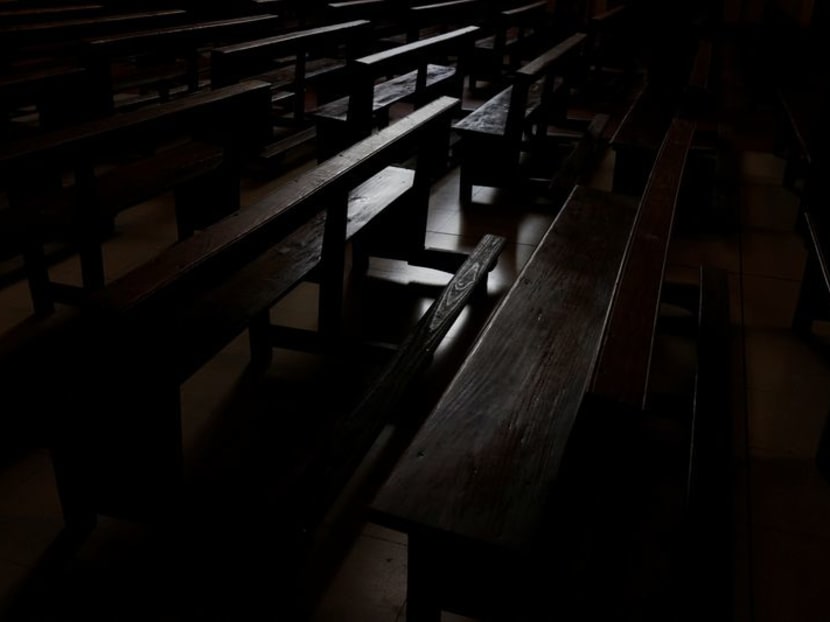 Empty pews are seen inside a Catholic church in Madrid, Spain, October 27, 2023.REUTERS/Susana Vera