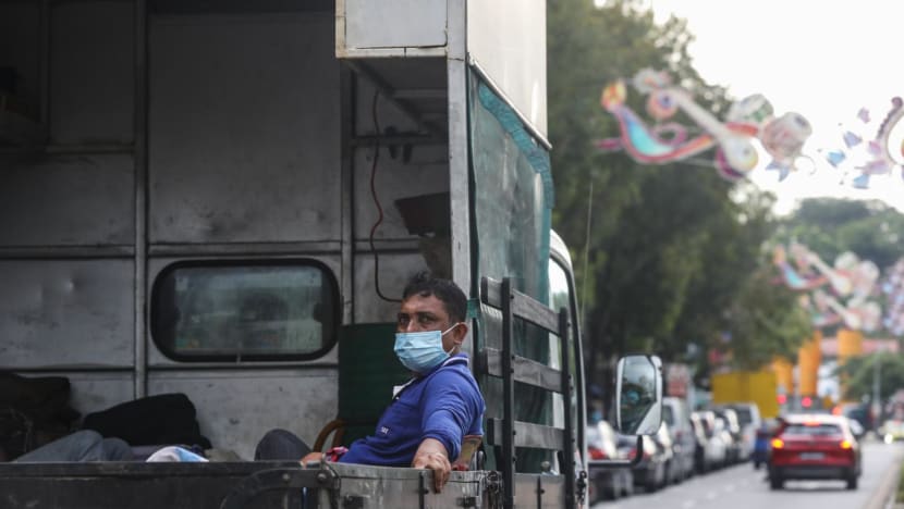 Business groups warn of 'complexities', more traffic jams if firms banned from ferrying workers on back of lorries