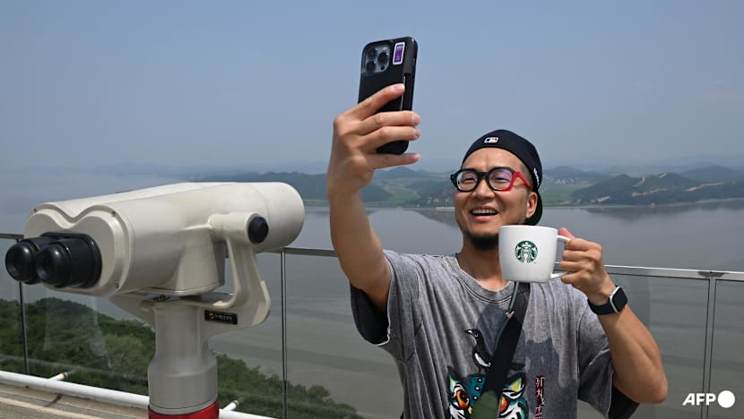 Coffee with a view: Tourists flock to Starbucks overlooking North Korea