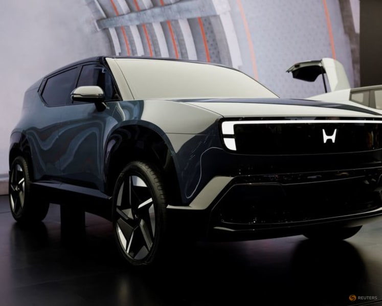 Honda shares slide more than 5% as automaker faces first annual loss