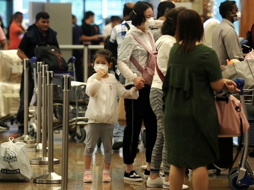 Employers must seek approval from MOM for work pass holders returning to Singapore after travel to China