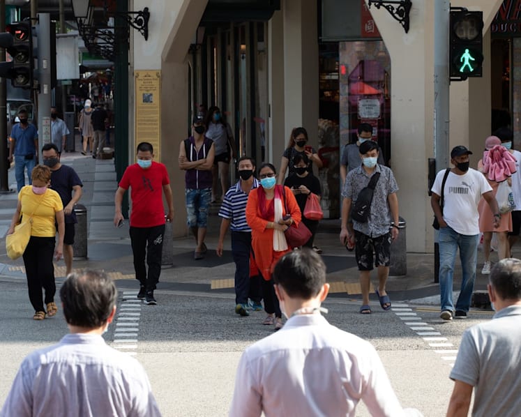 Covid-19: S'pore reports first imported case in 5 weeks among 407 new infections