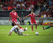 Singapore advance to ASEAN football championship semi-finals after draw with Indonesia