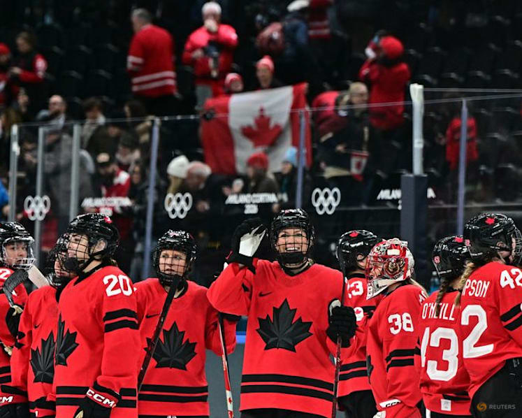Ice hockey-Poulin powers Canada into women's final with US
