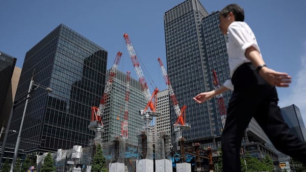 Japan's economy cools on weak capex in Q1, revised data shows