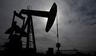 Investors fear Big Oil could cut share buybacks as crude prices slump