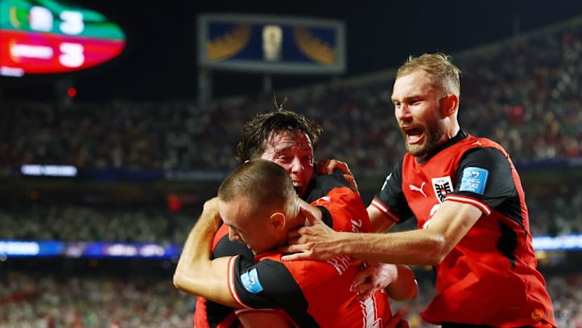 Austria and Algeria advance to World Cup round of 32, Iran eliminated