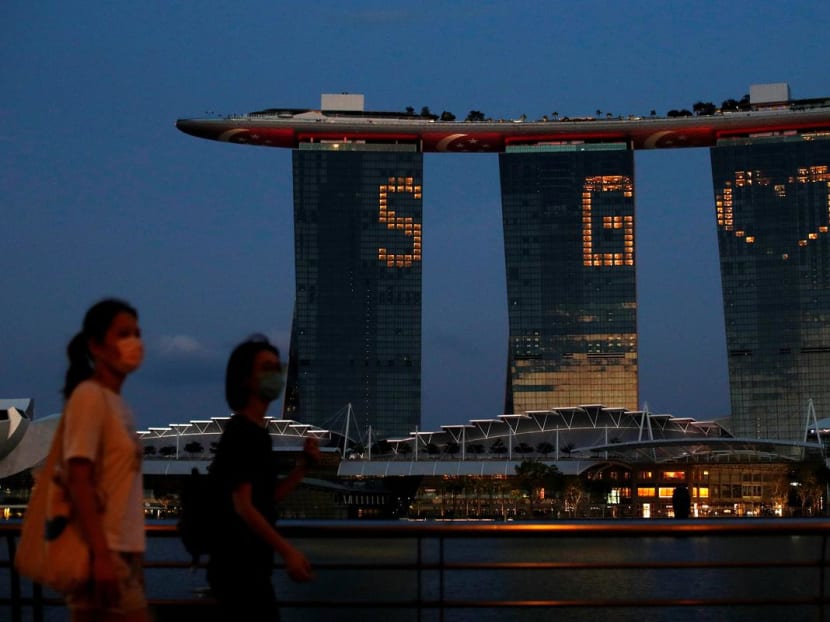 The Marina Bay Sands integrated resort lights up in tribute to the healthcare workers and people staying home to curb the spread of Covid-19 earlier in April.