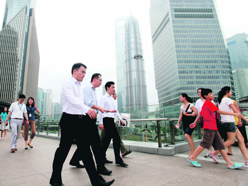Many office workers in China get only five vacation days a year. Photo: Bloomberg