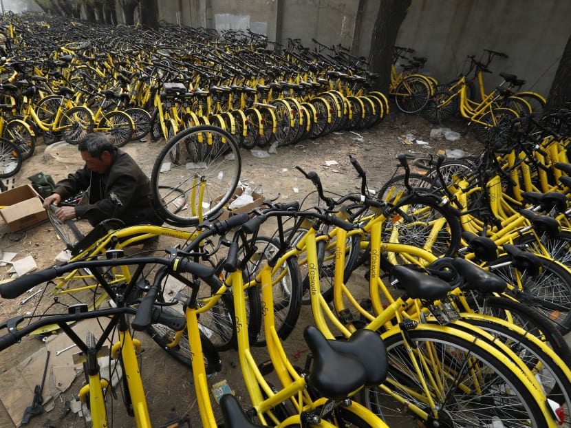 Bike-sharing rivalry crowds Beijing’s sidewalks