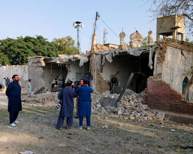 Bombing at mosque near police offices in Pakistan kills at least 21