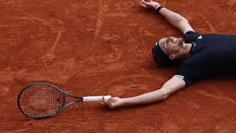 Zverev tears down the wall to enter Grand Slam winners' circle at French Open