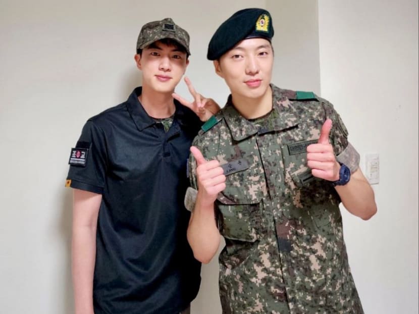 BTS' Jin shares photos of himself and Winner's Seungyoon as they serve their military service