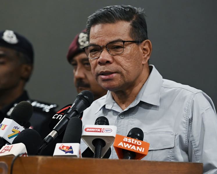 Malaysia's home minister says son under police investigation for alleged criminal intimidation