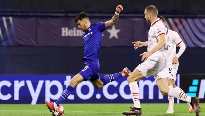 Ten-man Milan settle for playoff spot after Dinamo loss