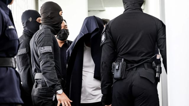 撞死17岁学生 马国警官被控谋杀蒙头出庭