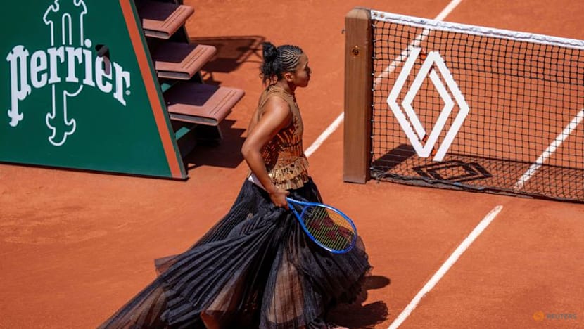 Osaka embracing role as entertainer after another grand walk-on