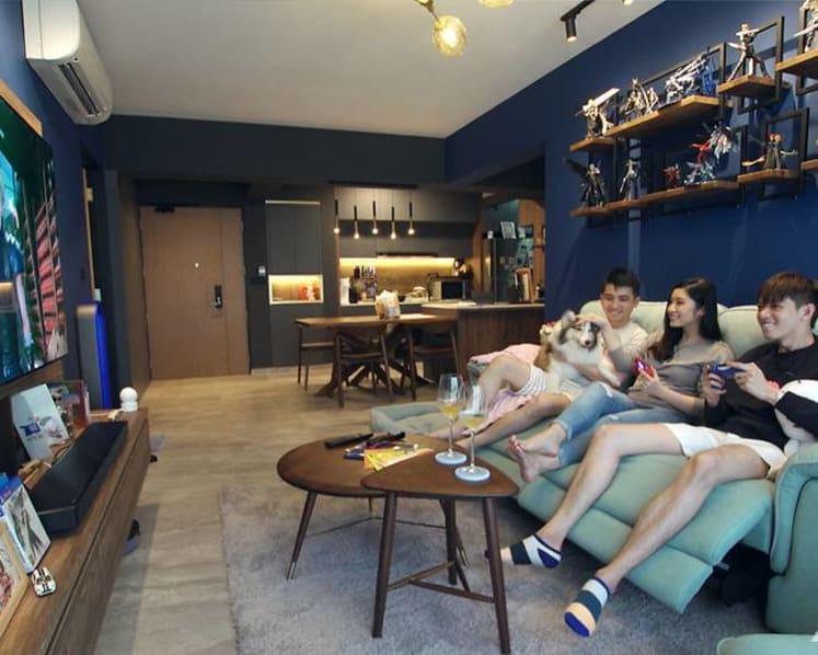 A geeky couple’s 1,001 sq ft BTO flat with a gaming room and toys on display