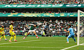 Mexico get World Cup party started with 2-0 win over nine-man South Africa