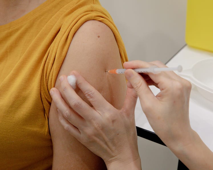Firms may require workers in higher-risk settings to be vaccinated, but shouldn’t penalise unwilling employees: MOM