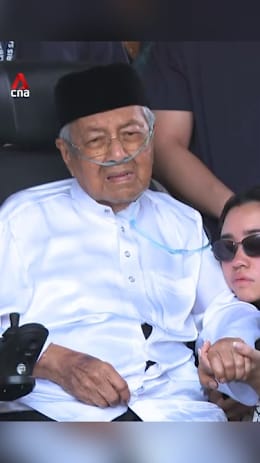 Former Malaysia PM Mahathir lays wife to rest