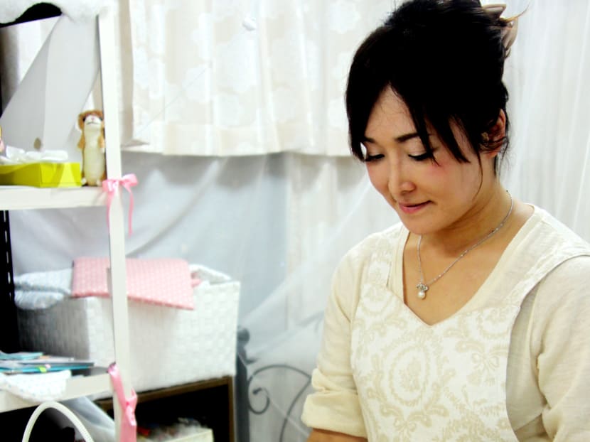 Ms Komichi Horiguchi, head of Nuigurumi Byoin or Stuffed Toy Hospital, with a ‘patient’. The Osaka-based hospital helps to clean and repair stuffed toys that have been torn, dirtied, or have missing body parts. Photo: Kyodo