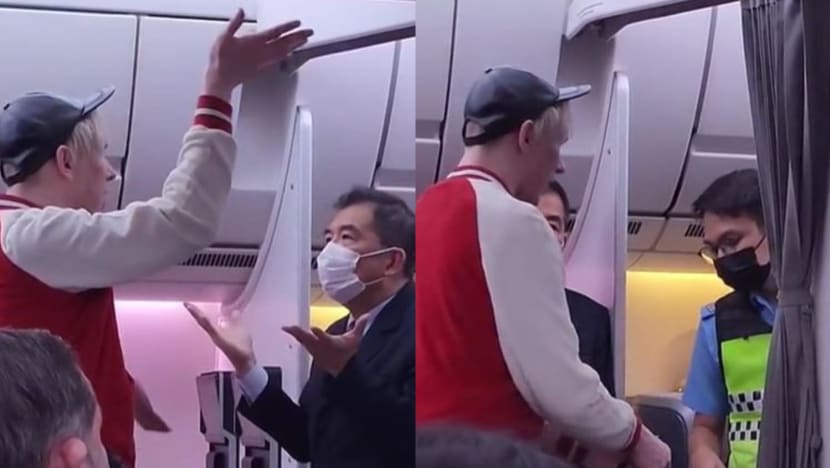 ‘Unruly’ passenger seen in viral clip hurling vulgarities at SIA cabin crew handed over to auxiliary police