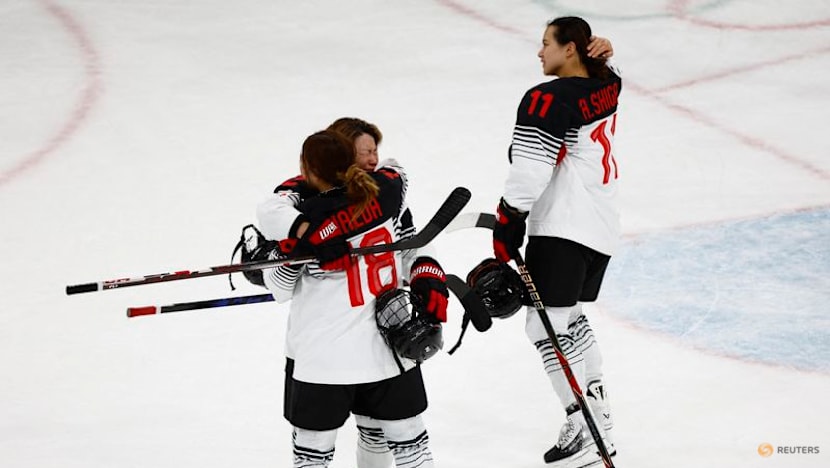 Ice hockey-Germany beat Italy and Sweden stay perfect