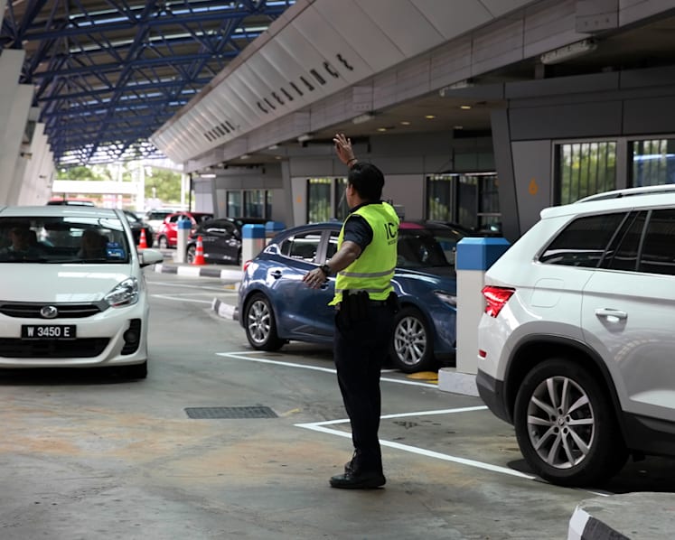 Causeway jams: Shanmugam admits ICA manpower crunch, officers ‘working their guts out’