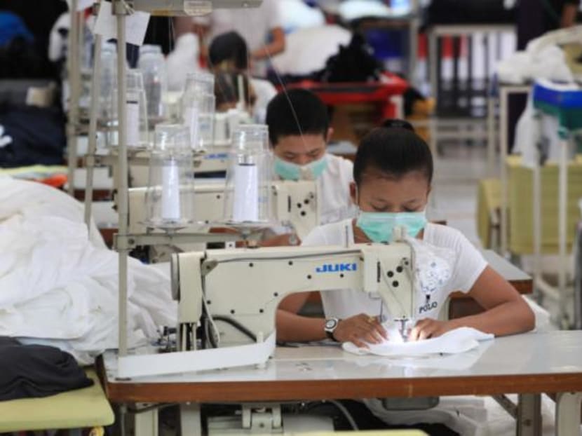 Workers in a garment factory in Mae Sot, Tak.  Photo: Bangkok Post