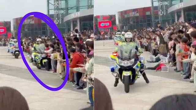 骑摩托表演失控撞飞数童 中国女交警未及时查看伤者引批评