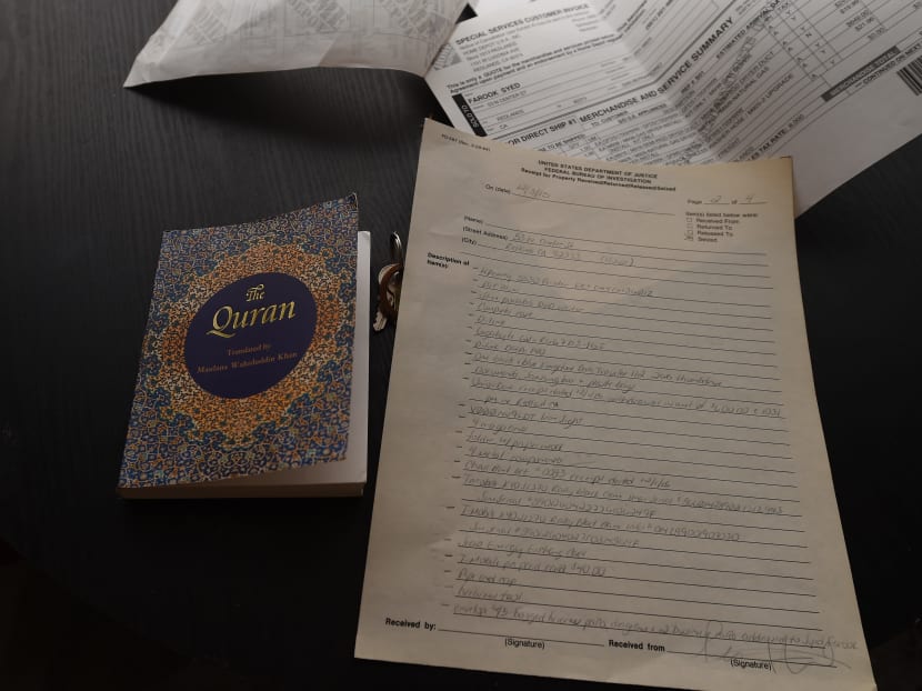 A copy of the Quran and a list of items seized by the FBI sit on a table in the home of San Bernardino mass murder suspect Syed Farook, on Dec 4, 2015 in Redlands, California. Photo: AFP